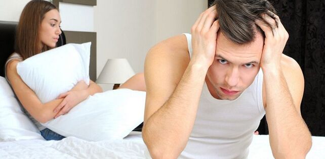Hombre y mujer en la cama